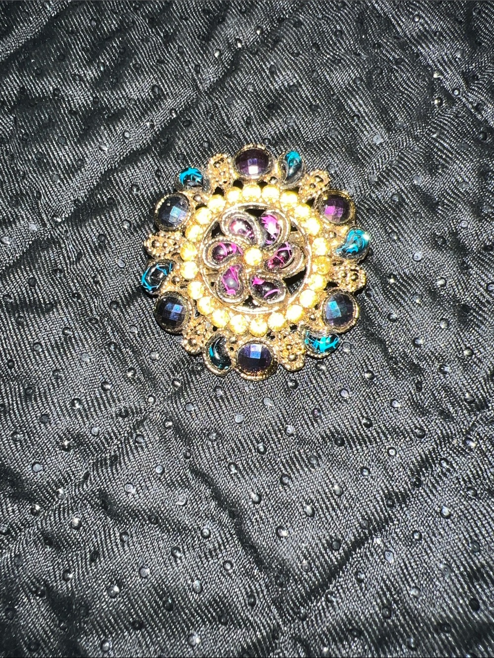 Gold-Tone Floral Crystal Brooch with Purple and Teal Accents